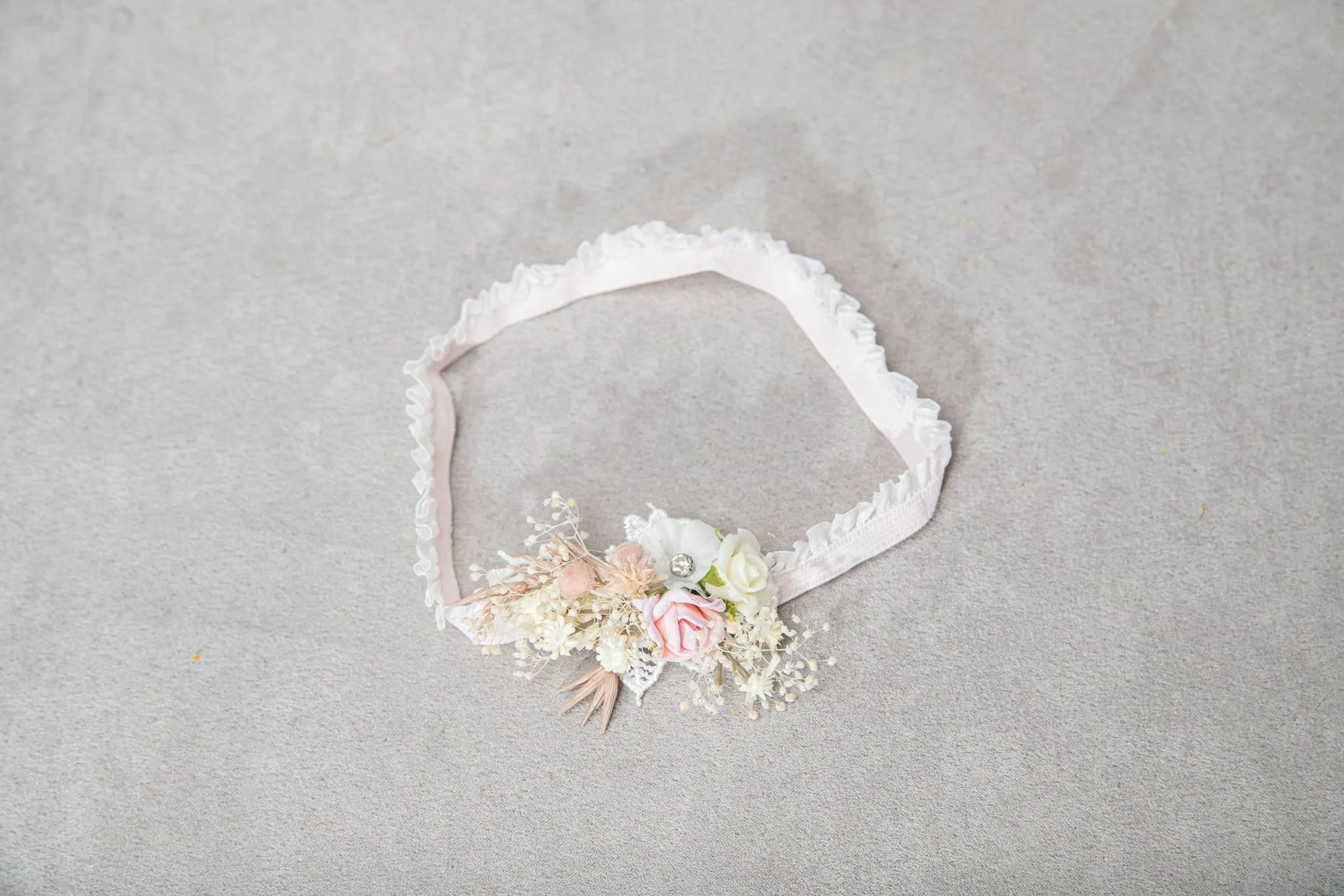 Romantic blush and white bridal garter