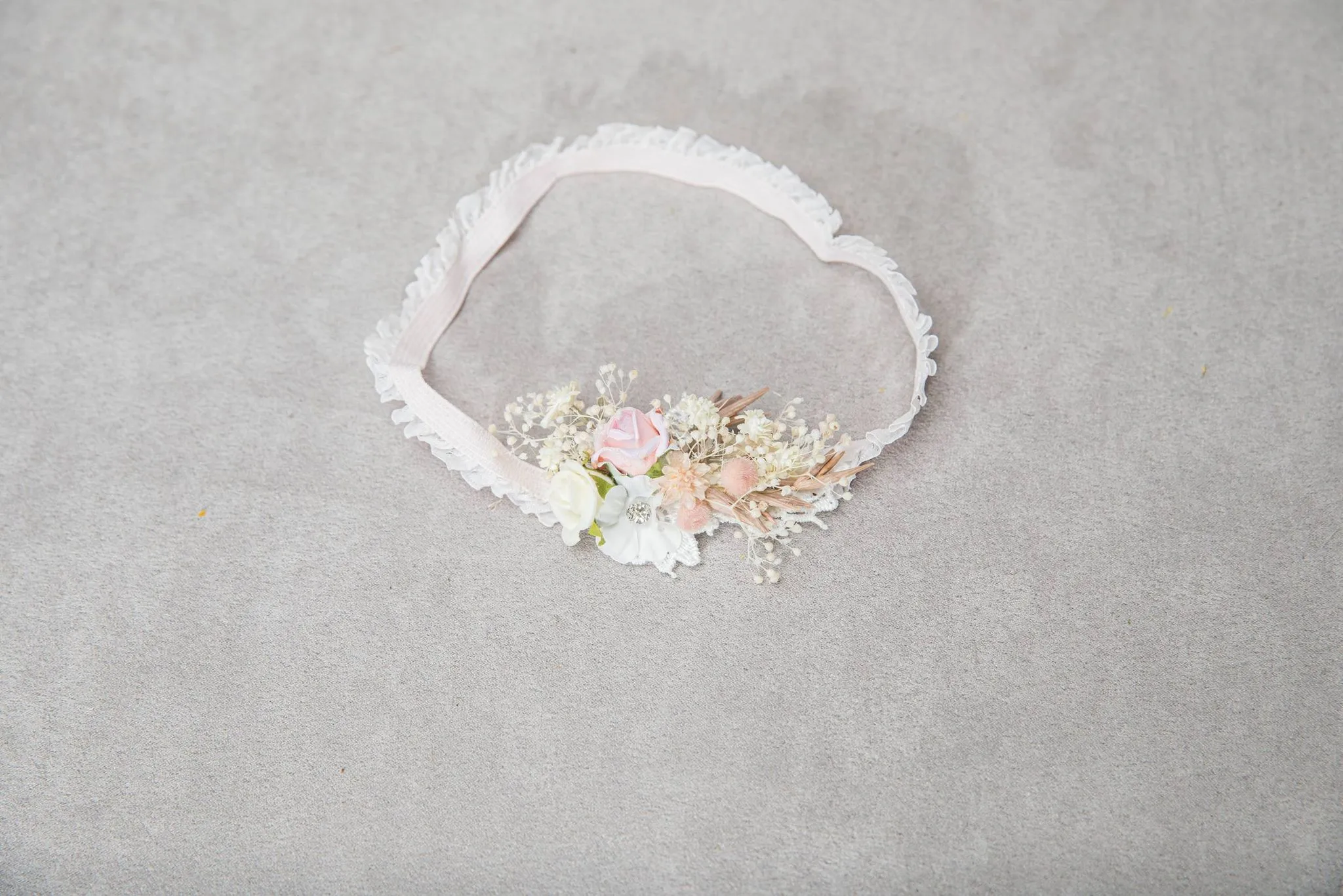 Romantic blush and white bridal garter