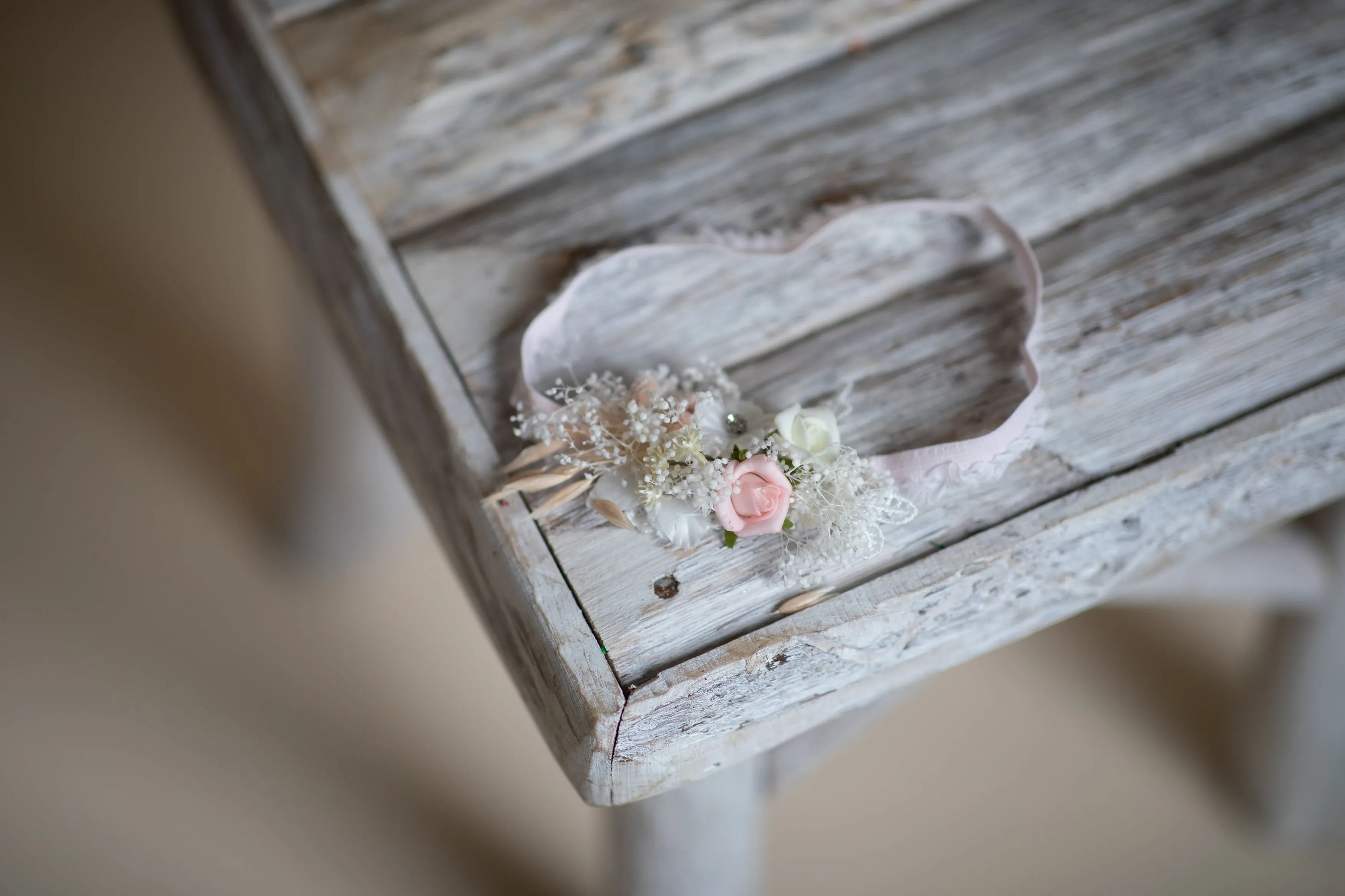 Romantic blush and white bridal garter