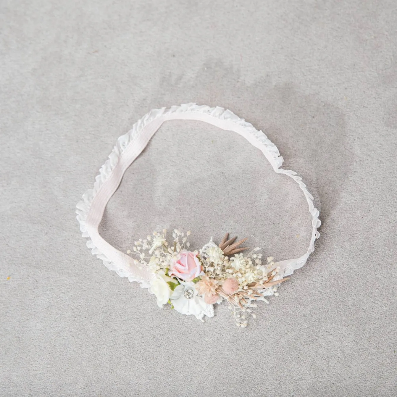 Romantic blush and white bridal garter