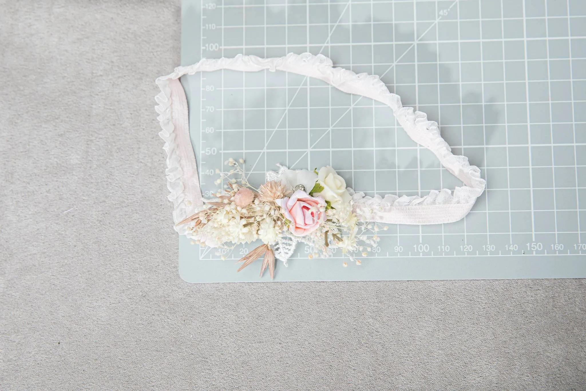 Romantic blush and white bridal garter