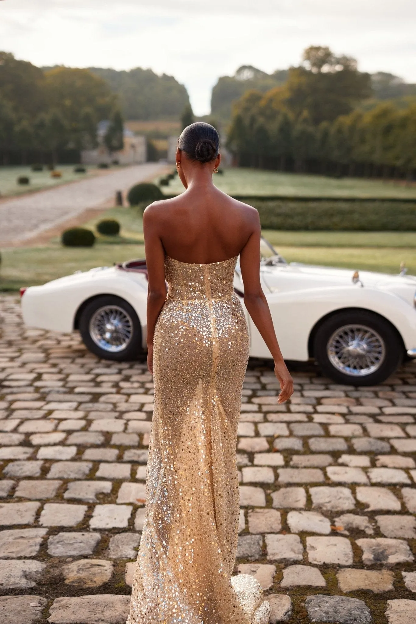 Showstopper maxi dress covered in gold sequins